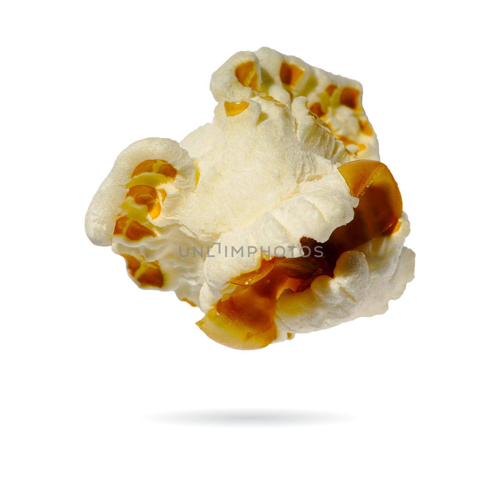 Macro popcorn isolated on white background. single popcorn