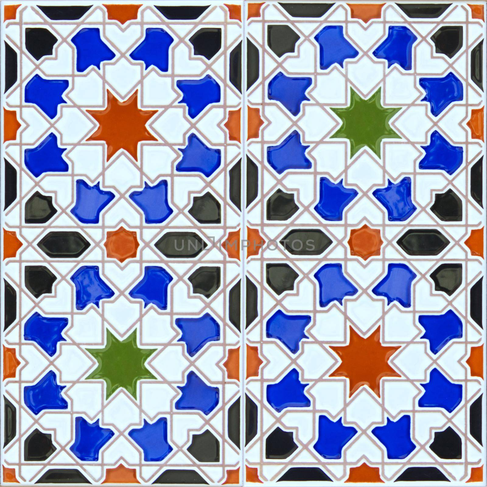 Seamless ceramic tile in the Spanish Andalusian style suitable for a background pattern by tennesseewitney