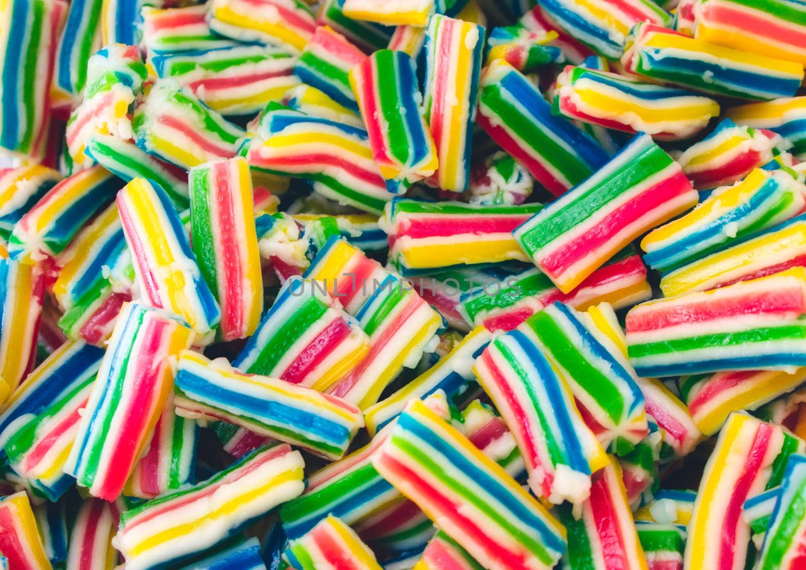 Full frame closeup of multi-colored candy chews / sweets