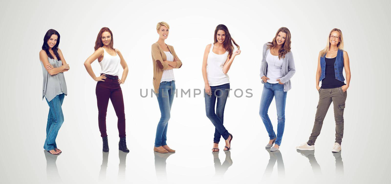 Beauty, style and confidence. Studio shot of a row of six young woman in casual clothing. by YuriArcurs