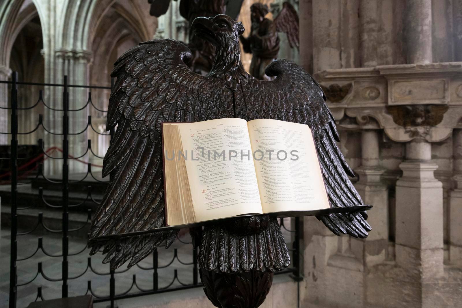 DIEPPE, FRANCE - FEBRUARY 05, 2019: An open bible on a stand in the shape of an eagle in a catholic Saint-Jacques church