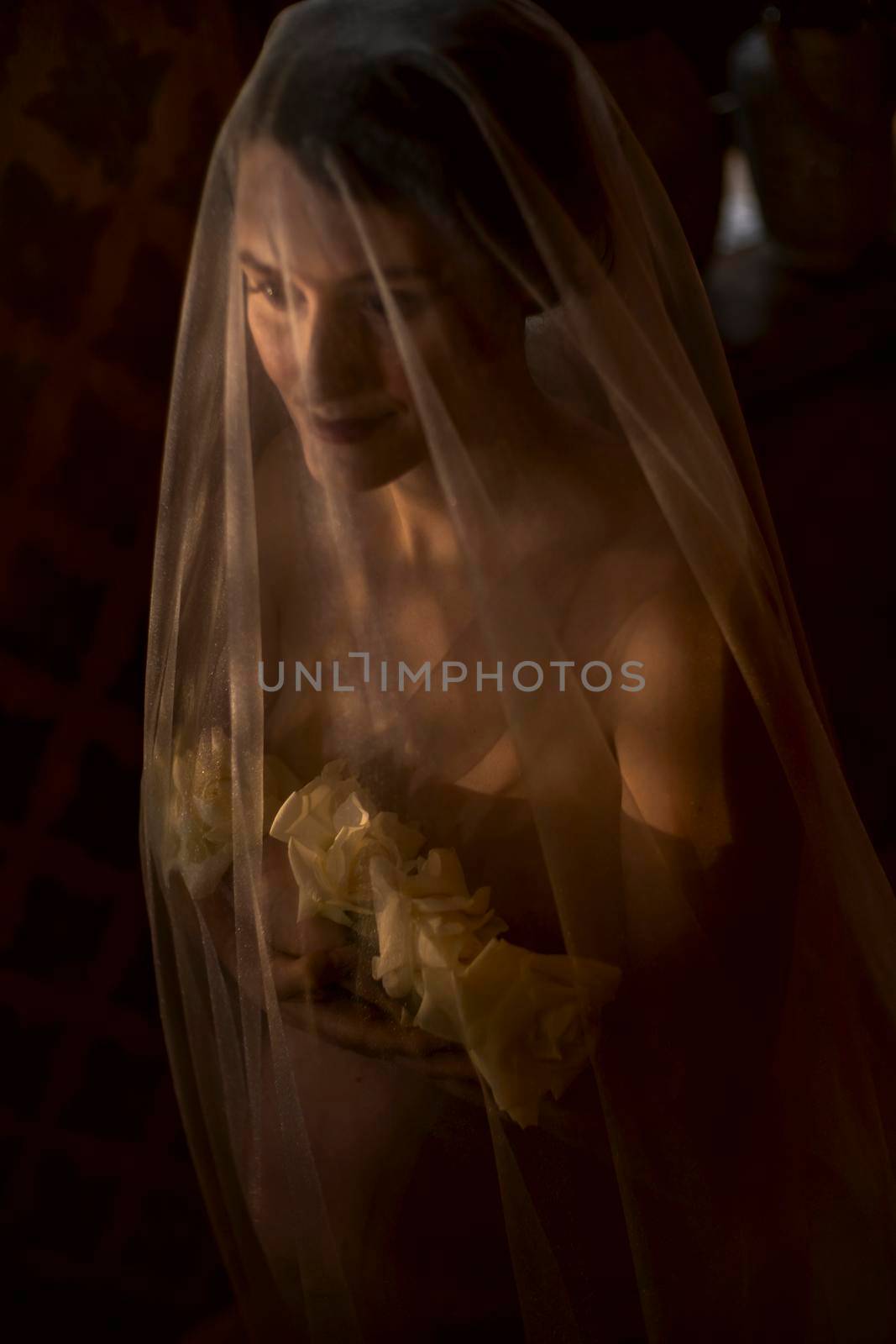 pregnant woman with a veil on her head by zokov