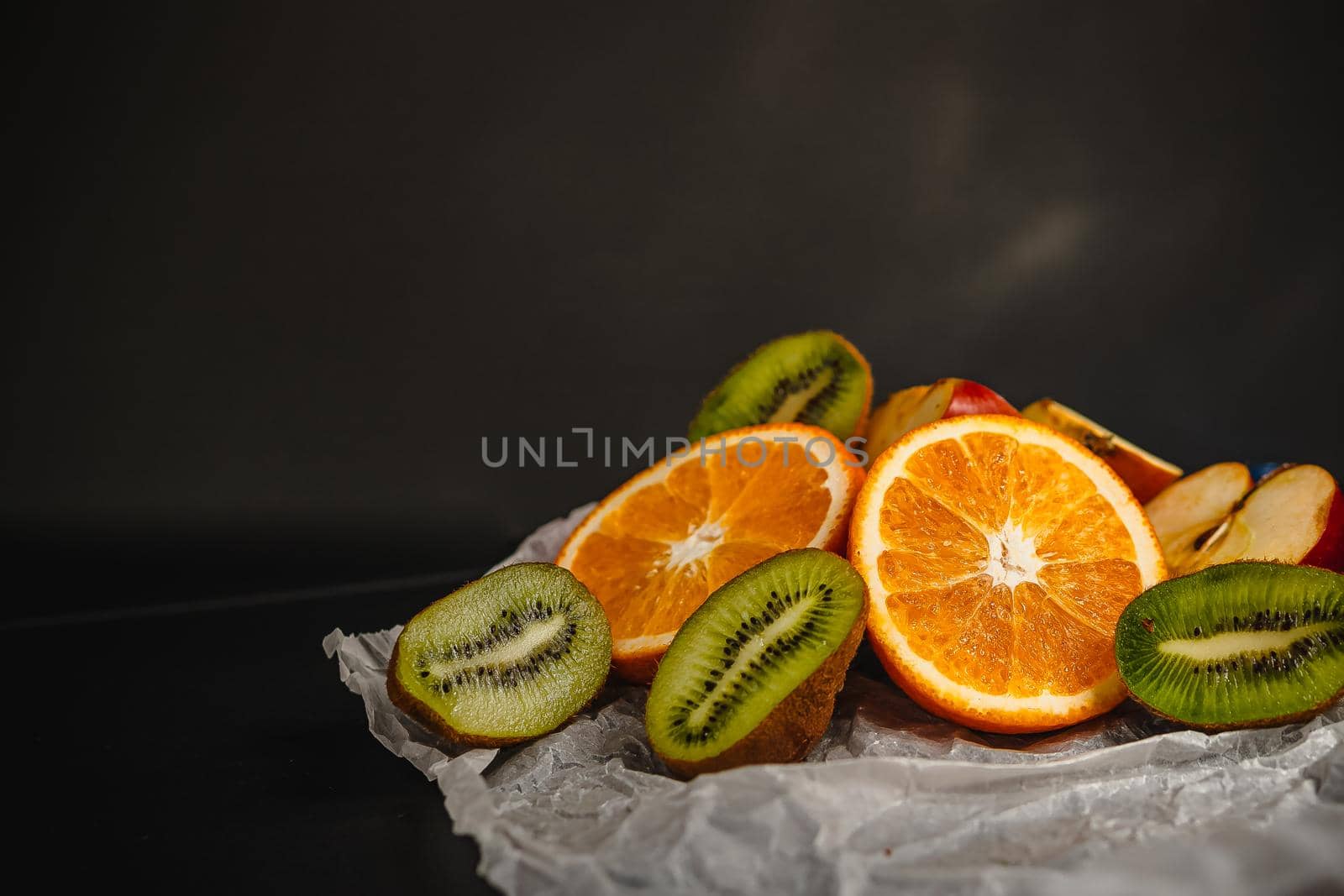 Luxurious fruit background. Studio photography of various fruits isolated on black background. Copy space. high resolution product