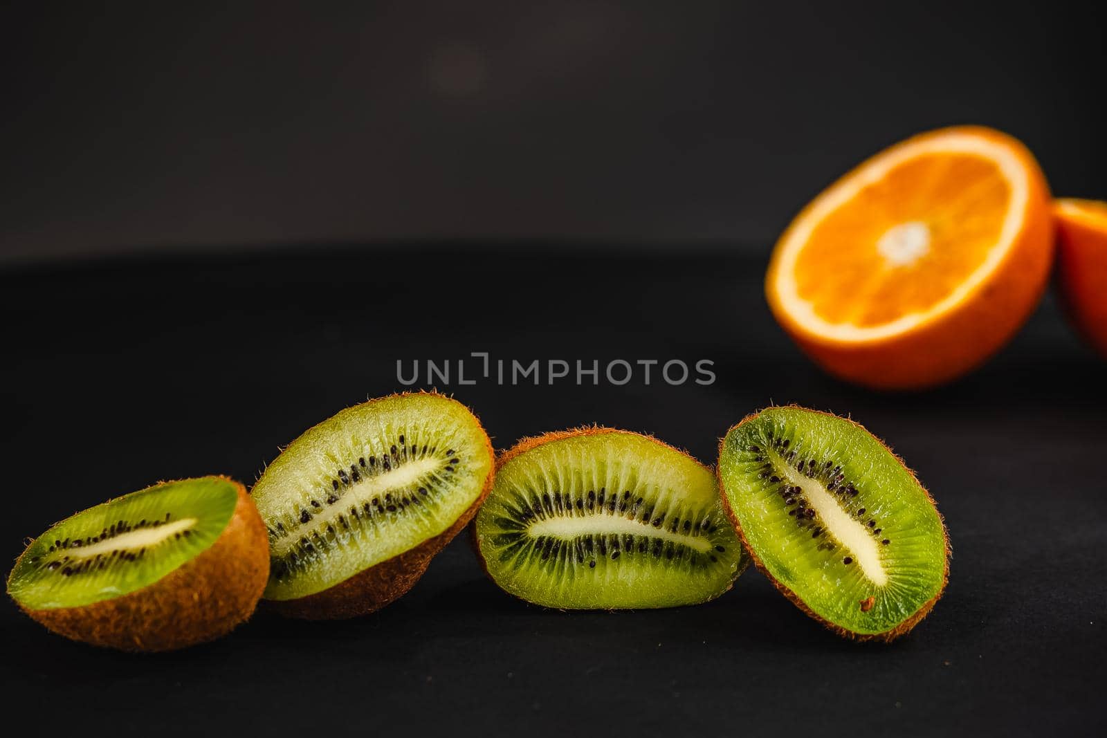 Luxurious fruit background. Studio photography of various fruits isolated on black background. Copy space. high resolution product