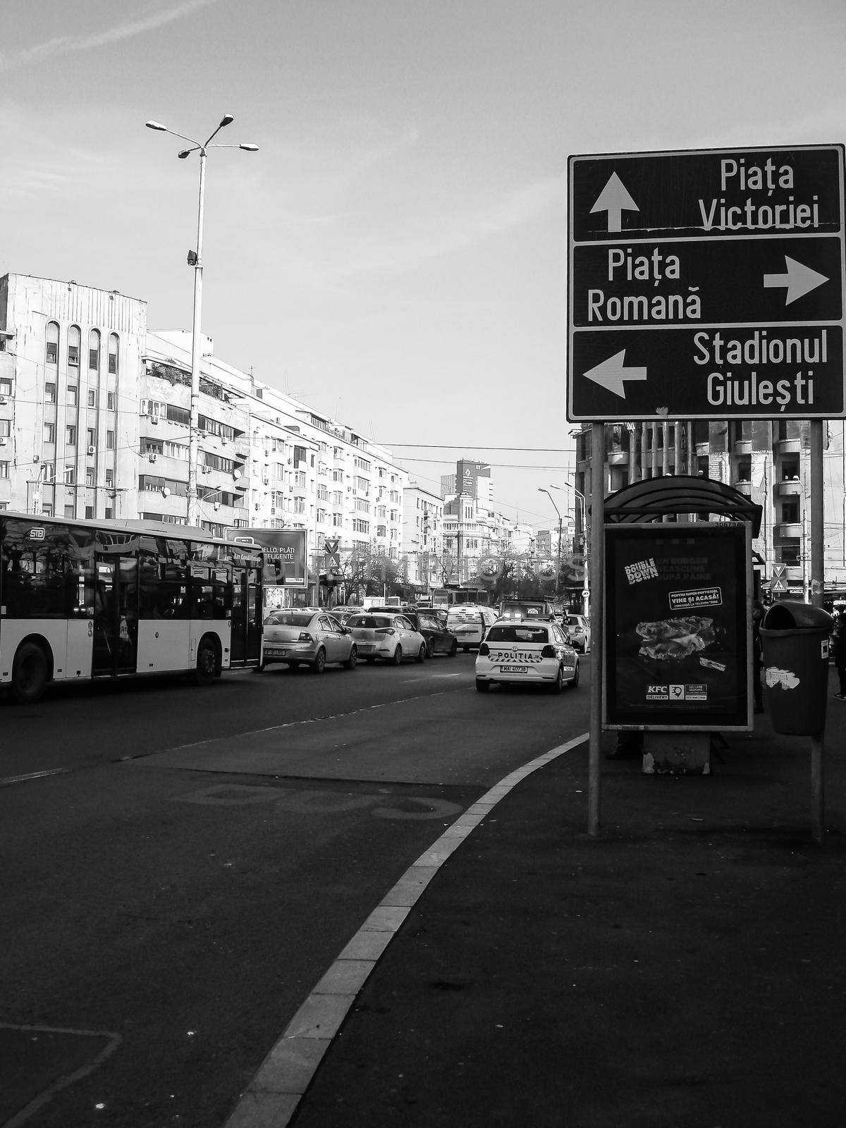 Car traffic, pollution, traffic jam city downtown Bucharest, Romania, 2022 by vladispas