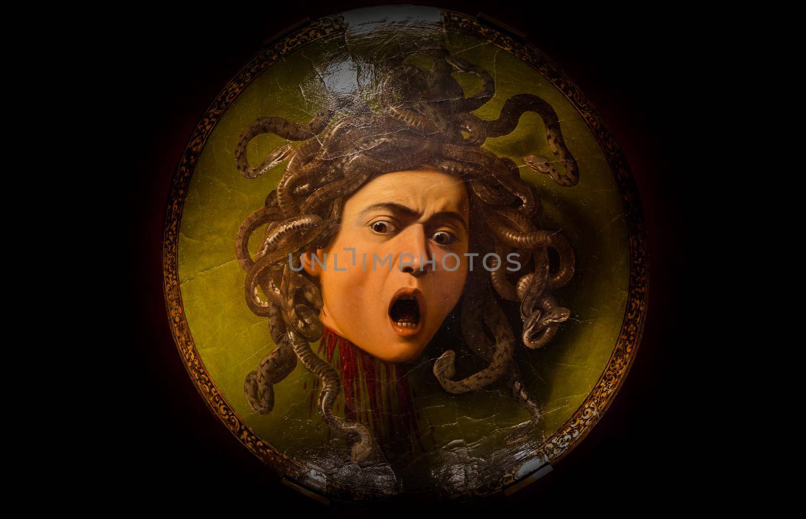 Florence, Italy - Circa August 2021: Medusa by Caravaggio, ca 1598 - oil on canvas. by Perseomedusa