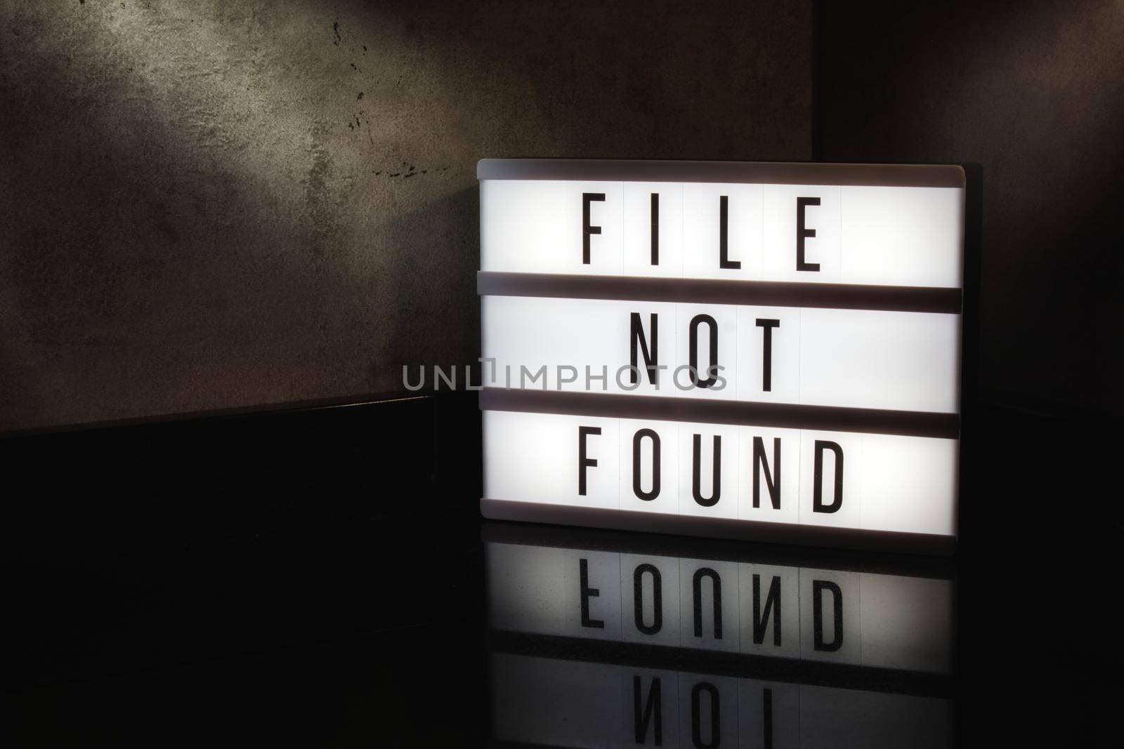 File not found message on a light box with a dark cinematic feel