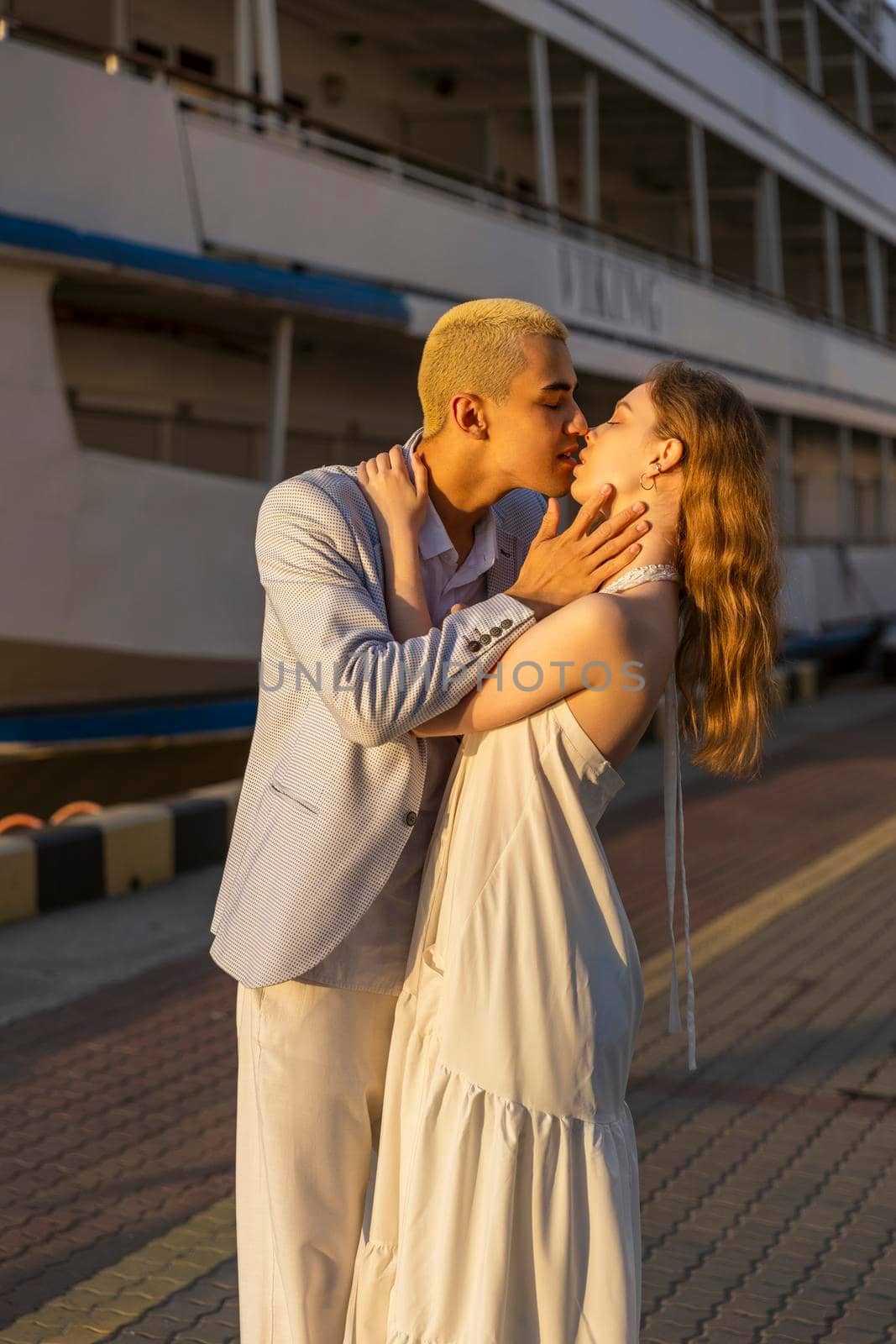 young couple walking in the seaport