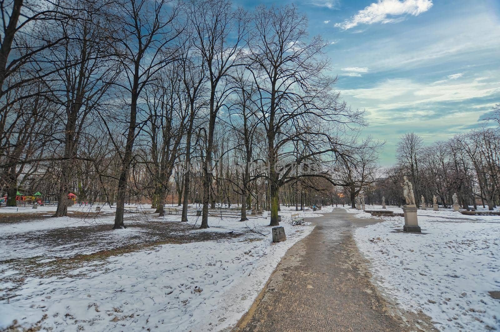 Park, garden in Warsaw of Poland with snow during the winter