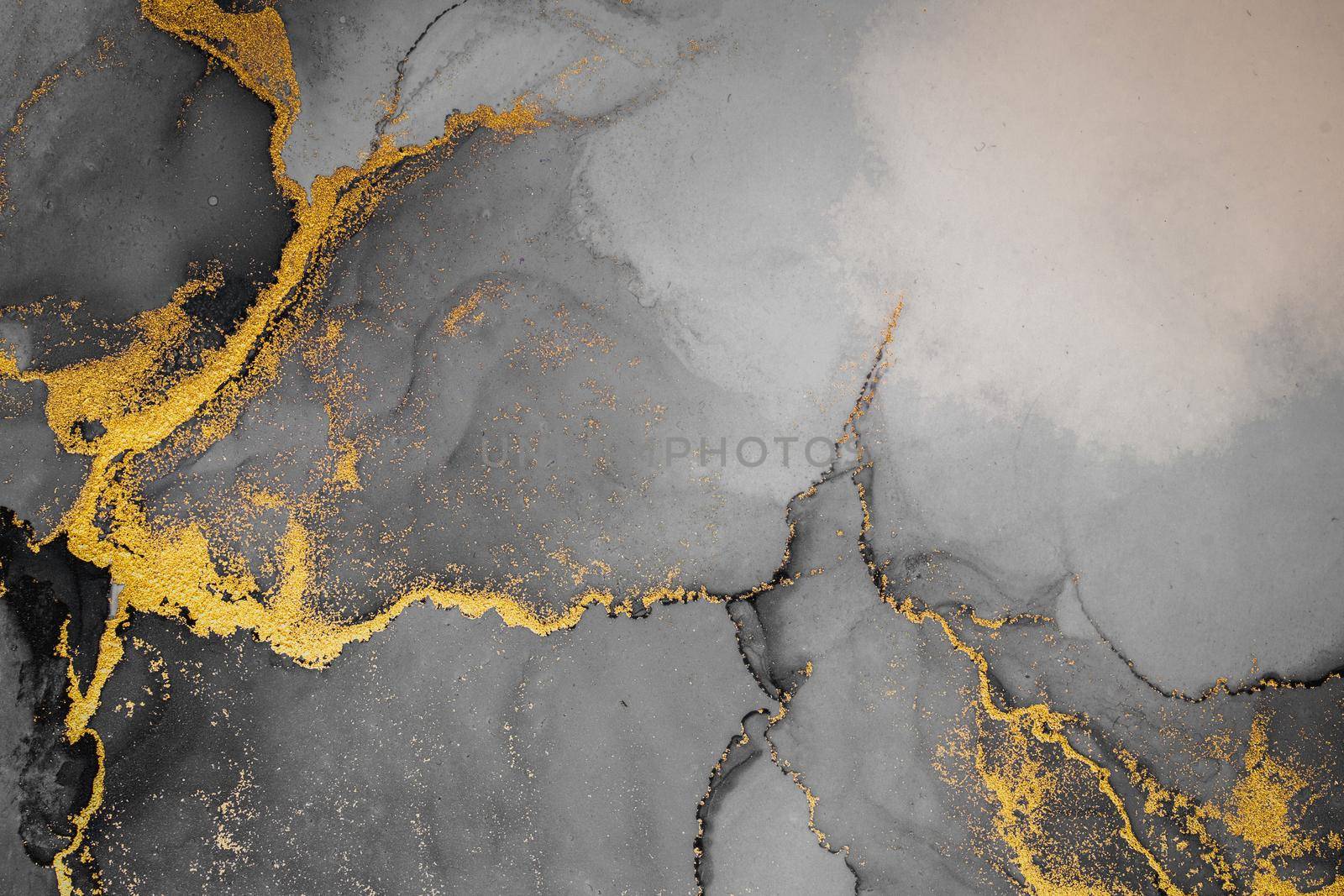 Dark gold abstract background of marble liquid ink art painting on paper . Image of original artwork watercolor alcohol ink paint on high quality paper texture .