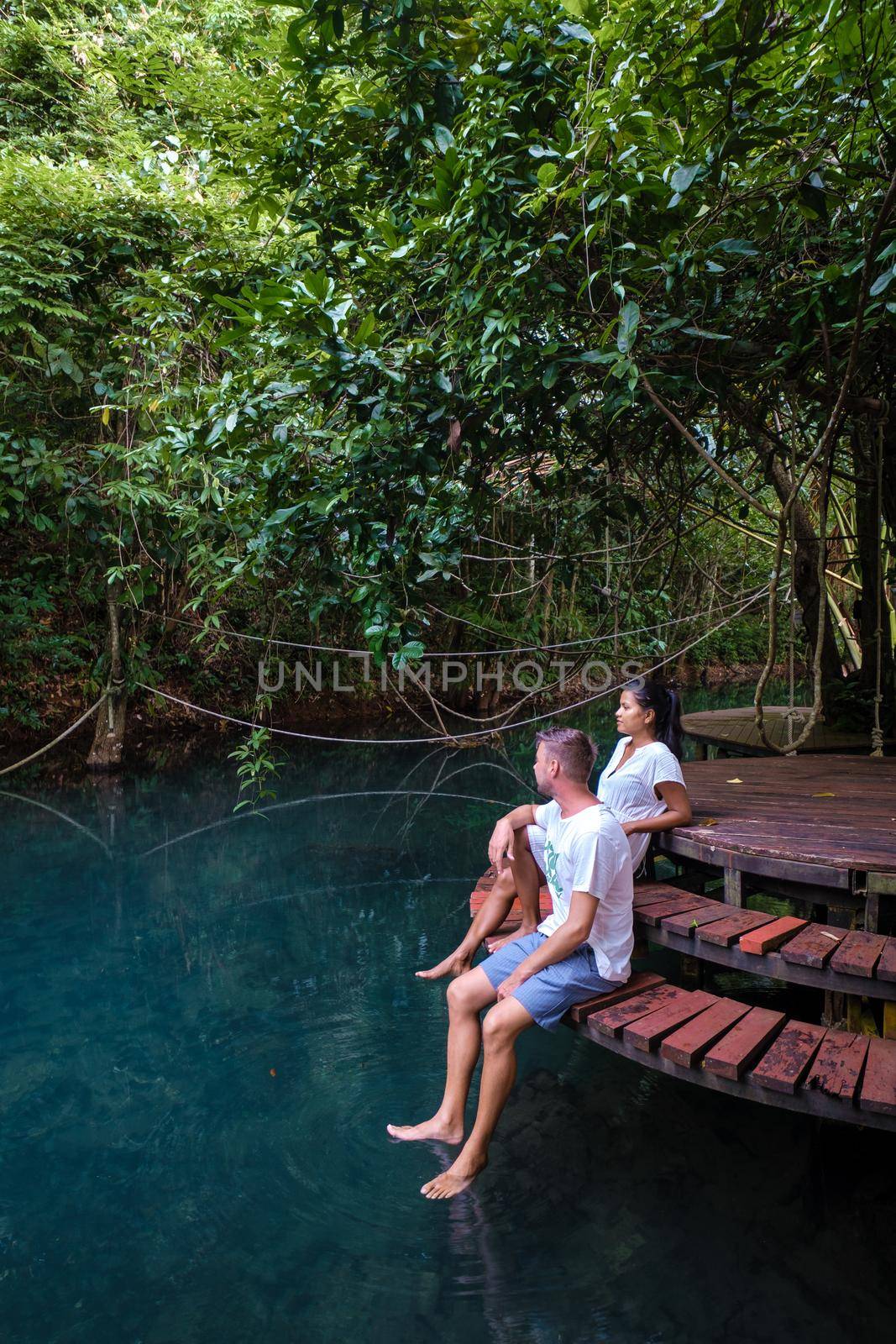 Klong Sa Kaew Krabi Thailand mangrove forest is popular for kayaking in the river of Krabi Thailand. Young Asian woman and European men at the lake