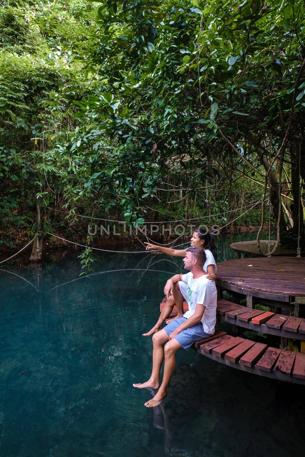 Klong Sa Kaew Krabi Thailand mangrove forest is popular for kayaking in the river of Krabi Thailand. Young Asian woman and European men at the lake