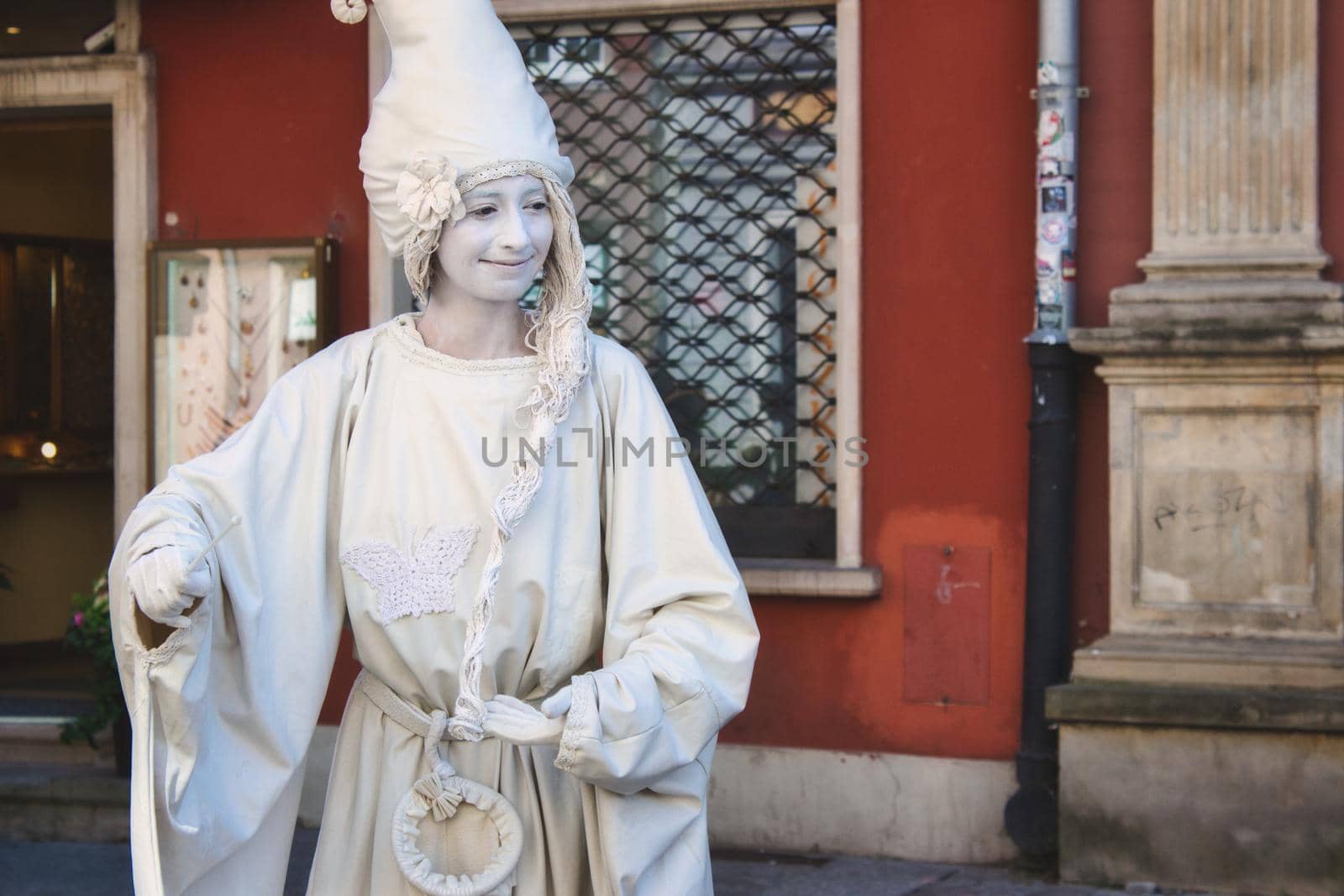 Gdansk / Poland - August 8 2019: An artistic live statue street performer busking in the old town of Gdansk