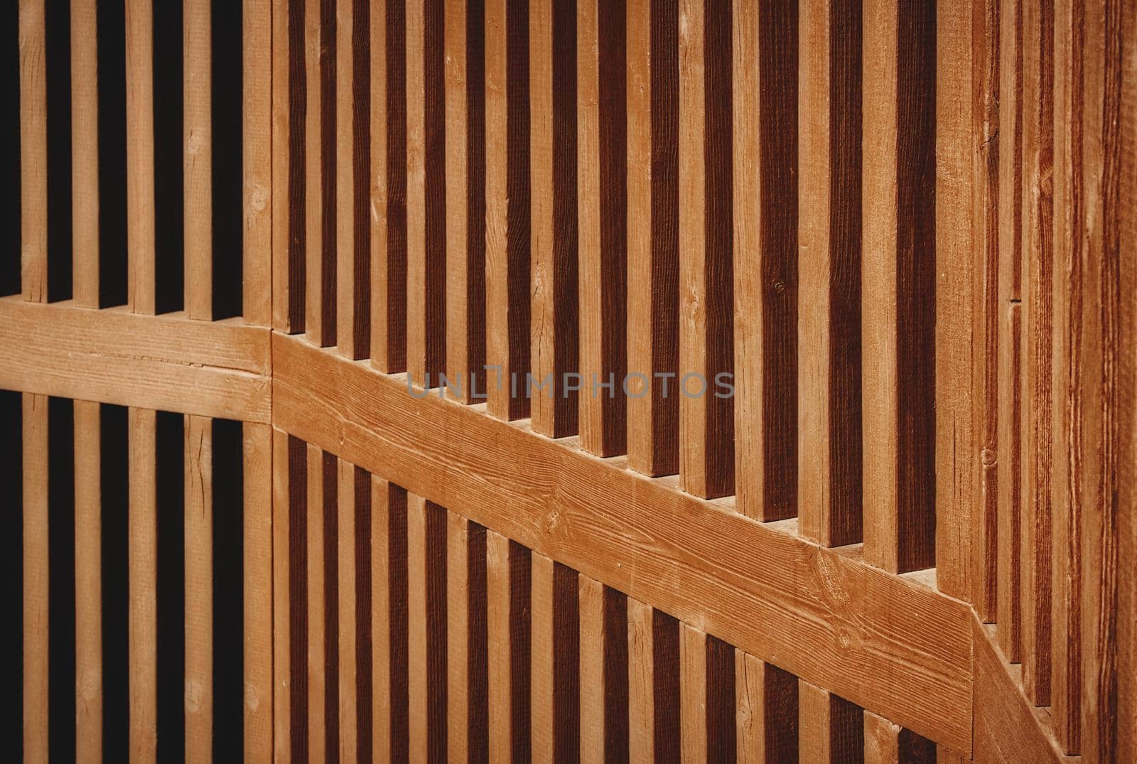Close-up of wooden fence forming a geometric pattern by tennesseewitney
