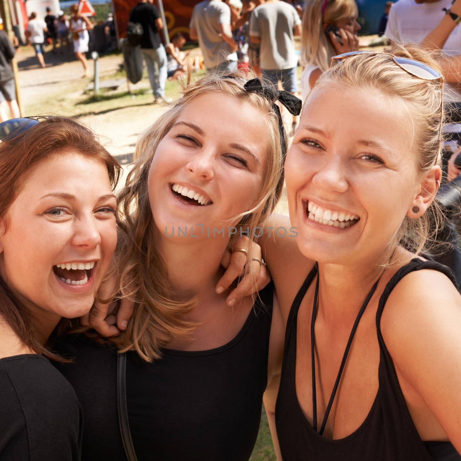 Skanderborg. Cropped shot of friends at the Skanderborg festival. by YuriArcurs