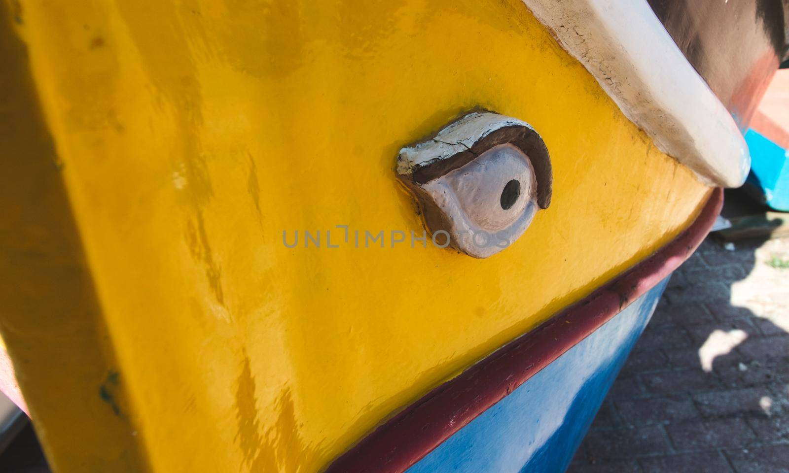 Close-up on the eye of a Luzzu, a traditional Mediterranean fishing boat