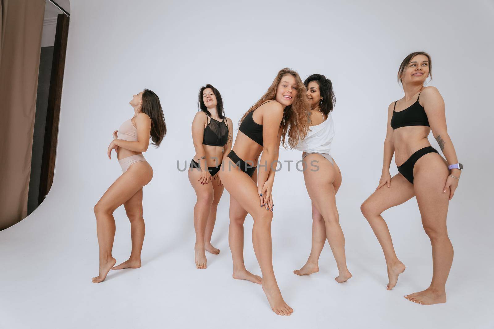 diverse models wearing comfortable underwear, enjoying time together, look at camera having smile and natural unique beauty