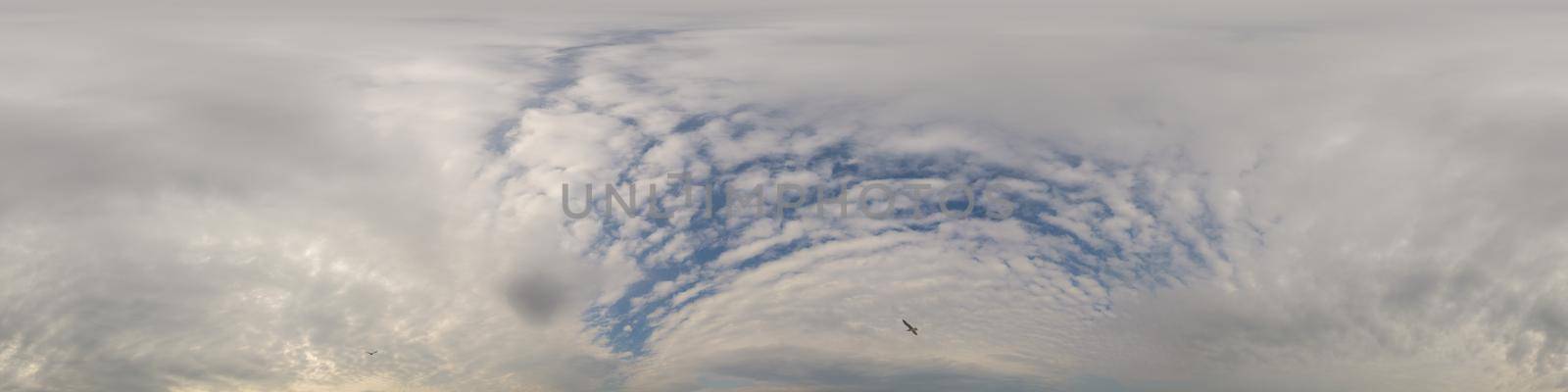 Sky panorama on overcast rainy day with low clouds in seamless spherical equirectangular format. Complete zenith for use in 3D graphics, game and for aerial drone 360 degree panorama as a sky dome.