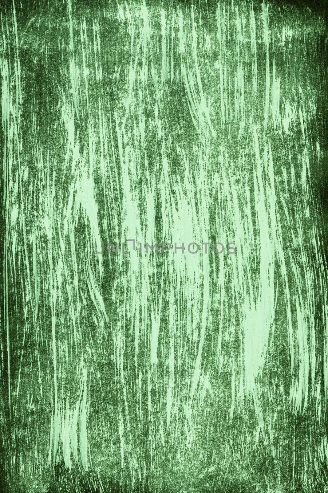 The painted leaf is green with a gouache brush. Hand-drawn gouache green abstract background. Texture of brush strokes.