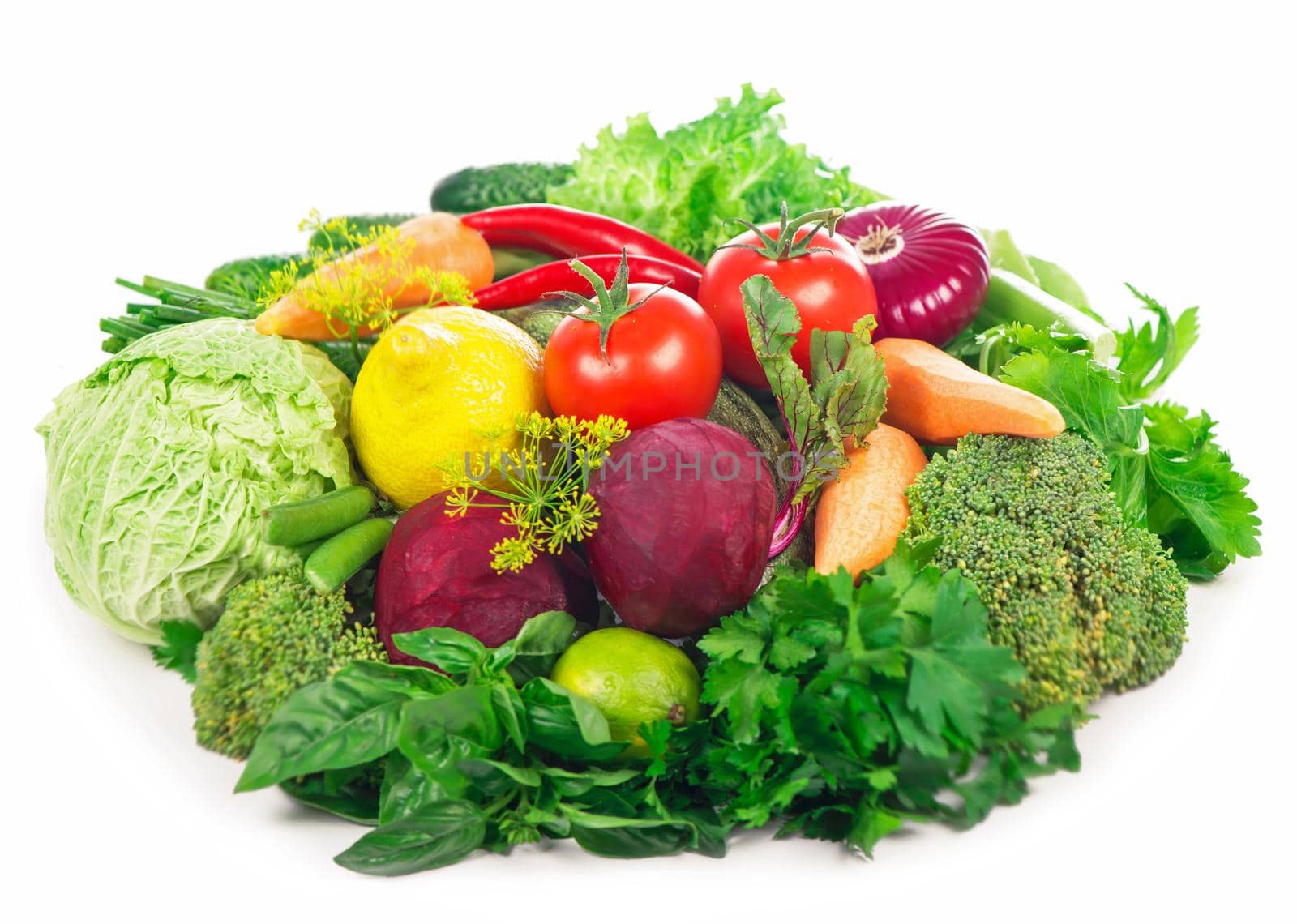 Healthy Eating. Seasonal organic raw vegetables. Isolated over white background