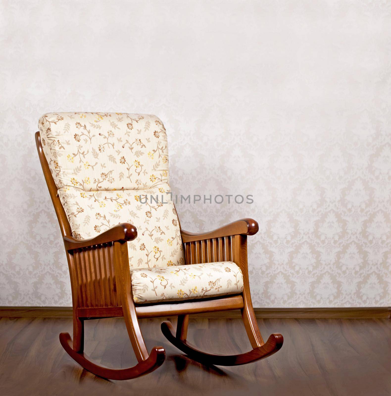modern rocking chair near a light wall