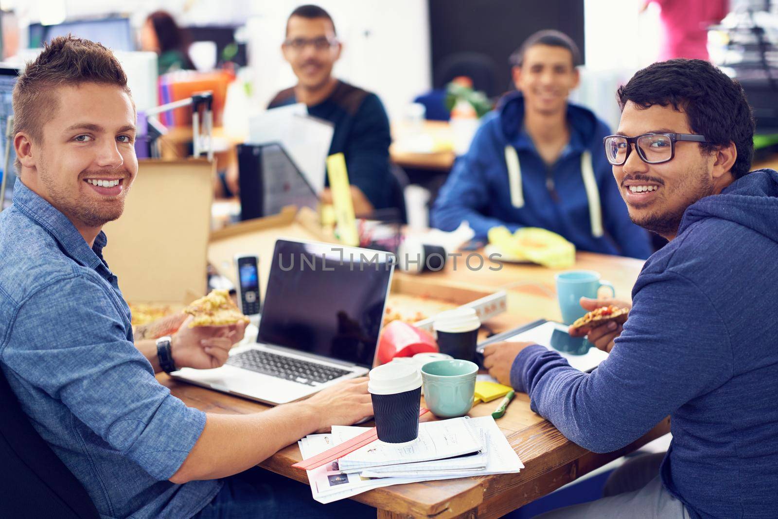 Shot of employees in an IT office.