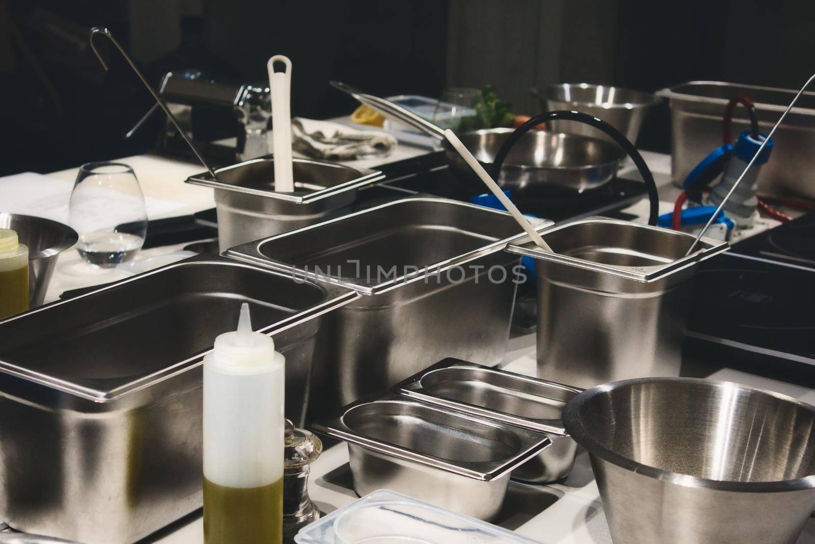 Stainless steel cooking containers in a professional kitchen by tennesseewitney
