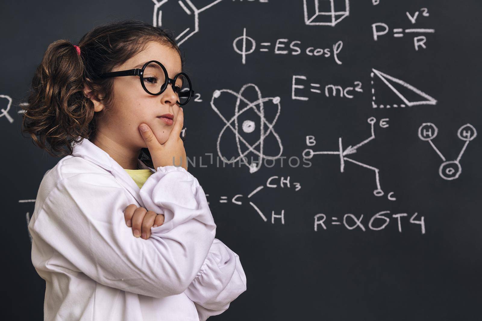 pensive little girl scientist in lab coat by raulmelldo