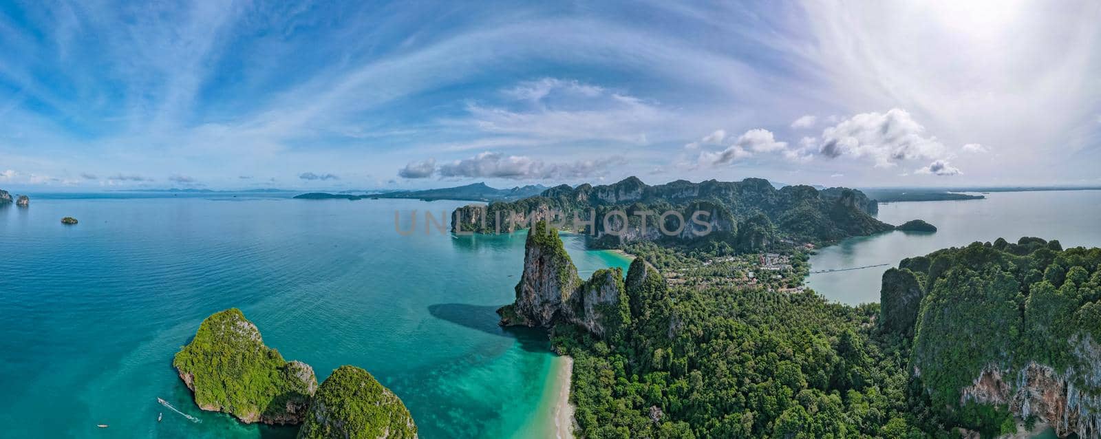 Railay Beach Krabi Thailand, the tropical beach of Railay Krabi, Drone aerial view of Panoramic view of idyllic Railay Beach in Thailand with a huge limestone rocks from above with drone