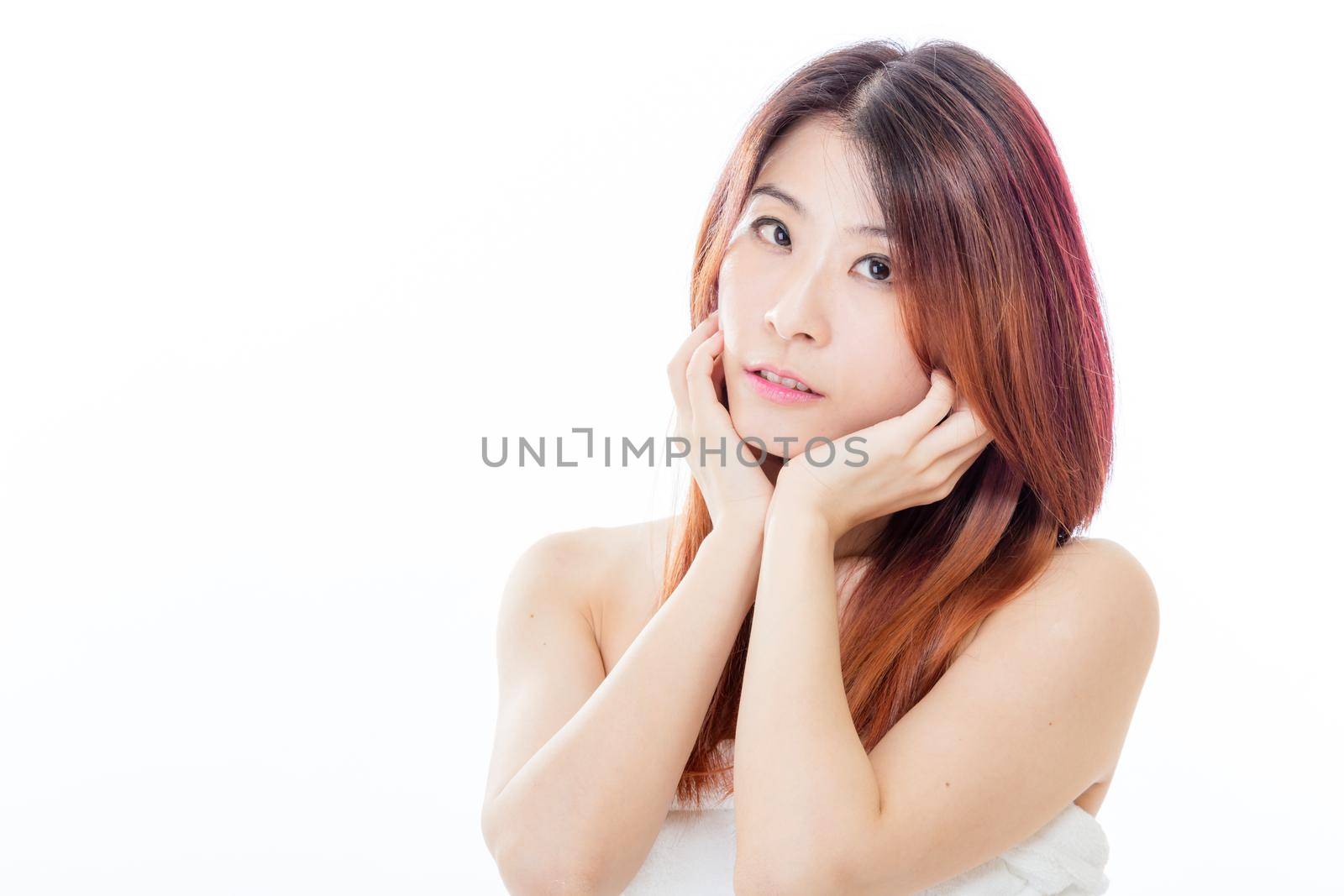 Chinese-American woman wearing a white towel on body, isolated, beauty concept