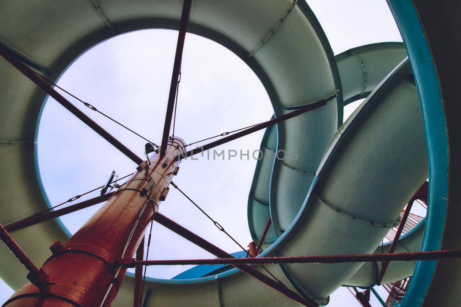 View from below a water slide looking up through the built structure by tennesseewitney