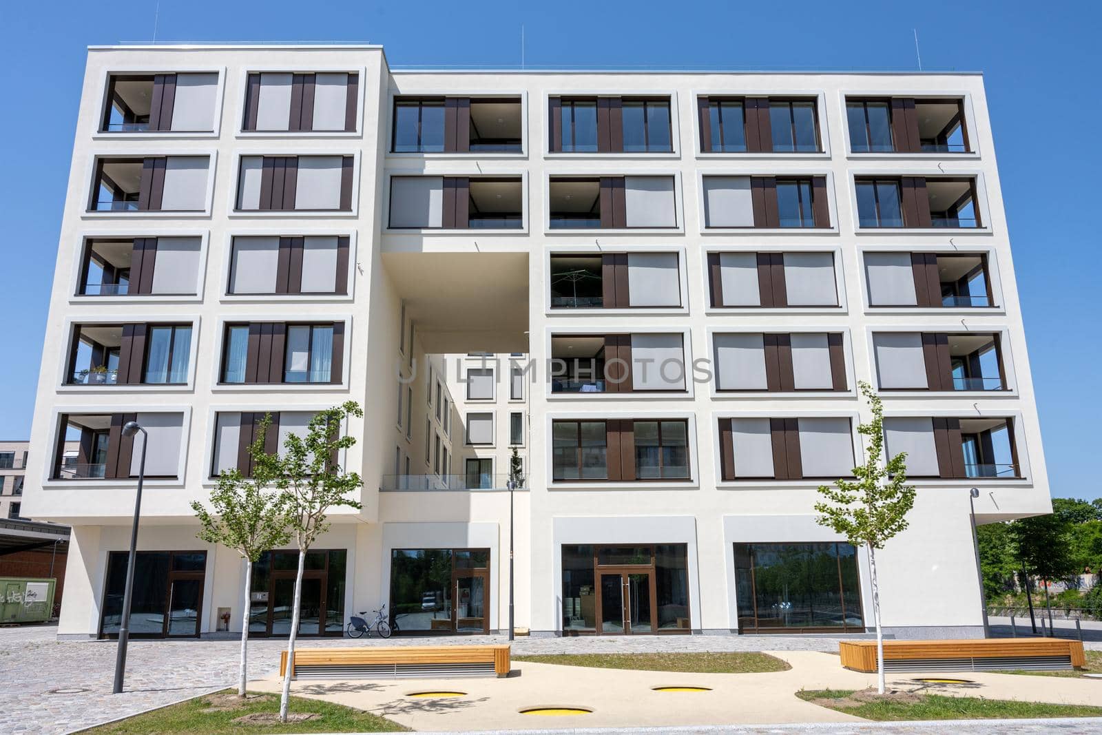 Modern apartment building in a housing development area by elxeneize
