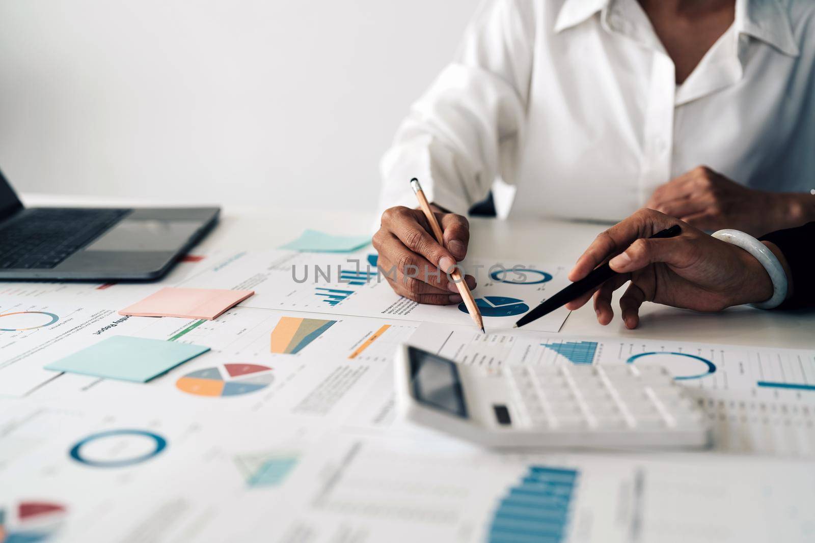 Close up Business people meeting to discuss the situation on the market. Business Financial Concept.