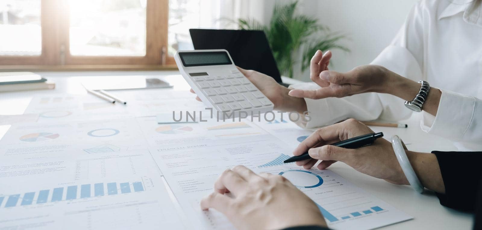 Business People Meeting to discuss and brainstorming project the financial report paperwork in office. Teamwork concept, financial advisor, accounting and business planning, investment analysis. by wichayada