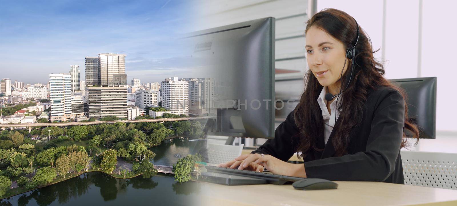 Business people wearing headset working in office to support remote customer or colleague. Call center, telemarketing, customer support agent provide service in broaden view .