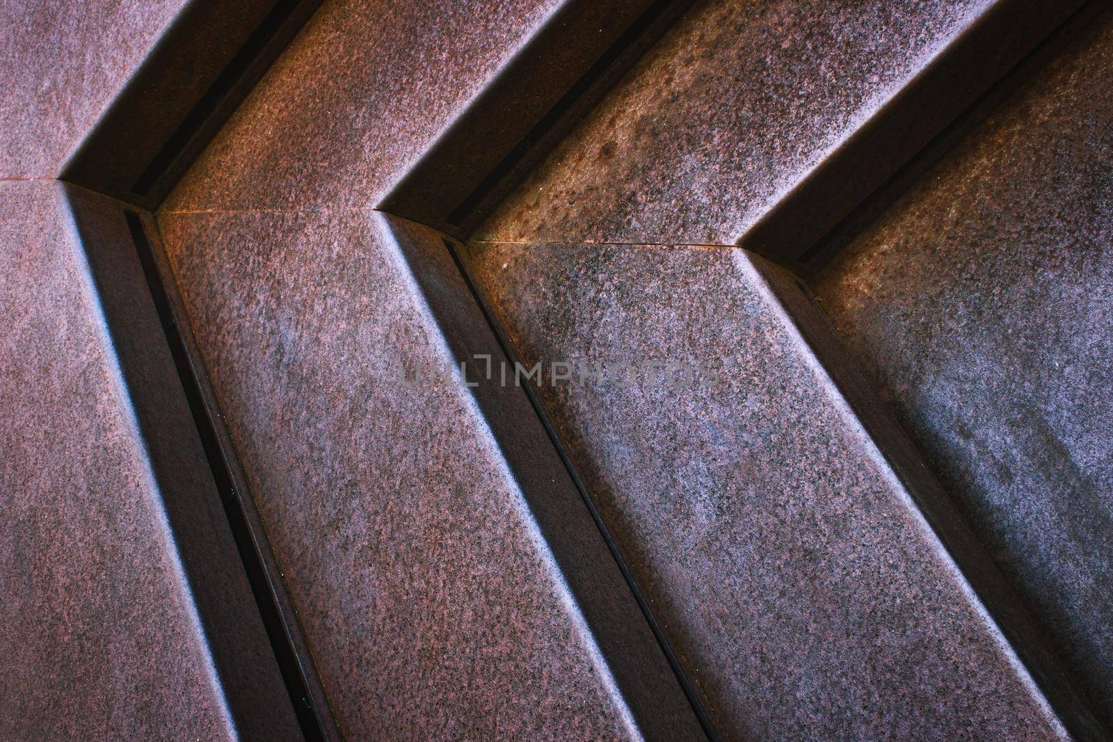 Close-up of grooves in modern iron metal structure forming an industrial texture background by tennesseewitney