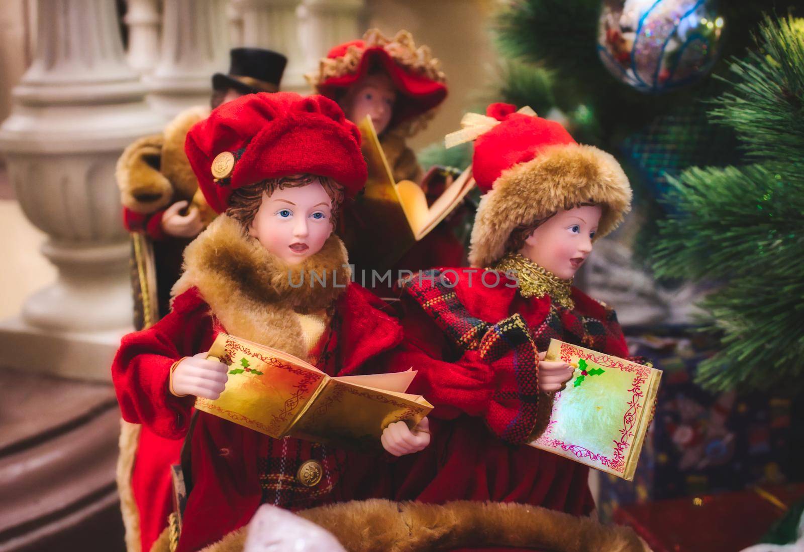 Classic traditional toy doll Christmas carol singers