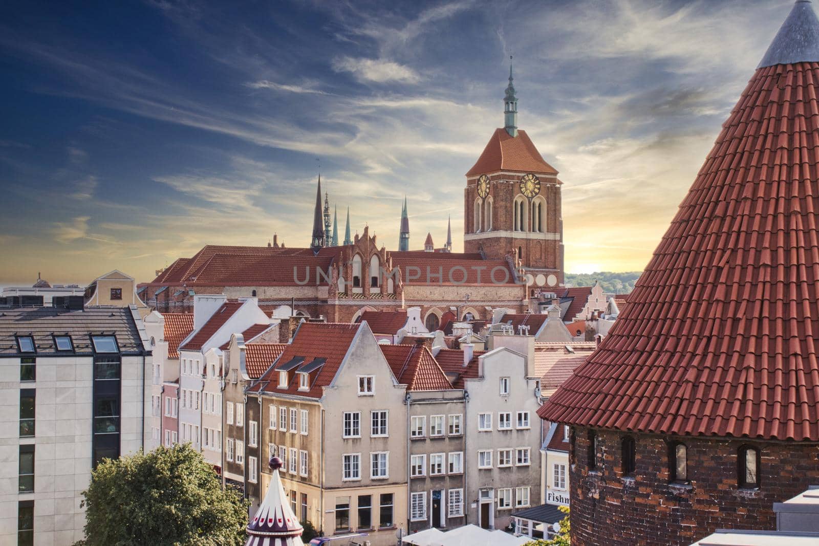 Aerial view of Gdansk city center with church clock tower in the distance