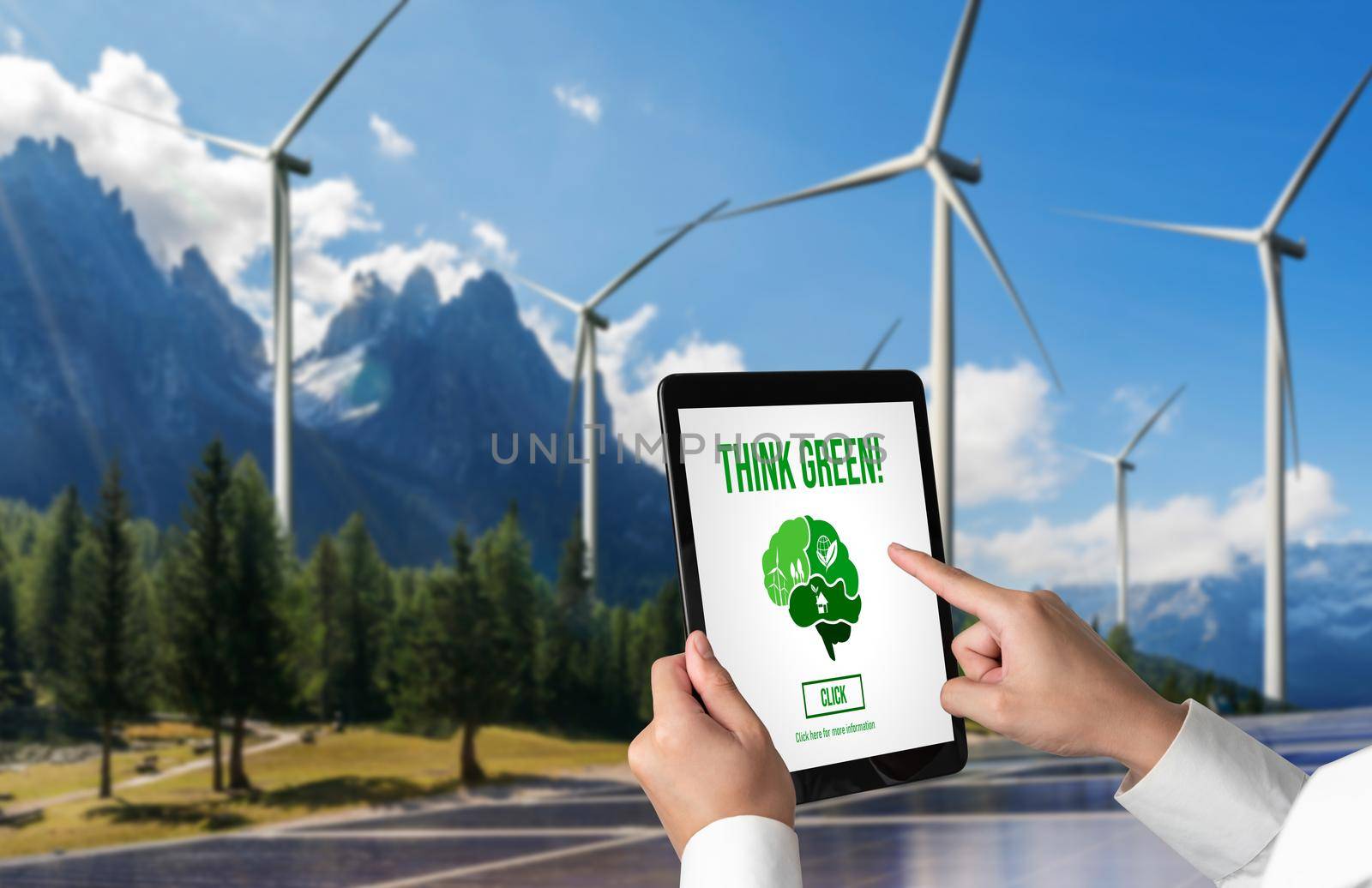 Green business transformation for environment saving and ESG business concept. Businessman using tablet to set corporate goal toward environmental friendly management and alternative clean energy use.
