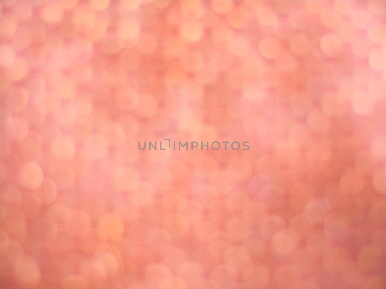 Blurred background. Pink spring background.Pink gold, pink rose bokeh,Pink Gold shining lights, sparkling glittering Valentines day,women day,event lights romantic backdrop.Blurred abstract holiday background