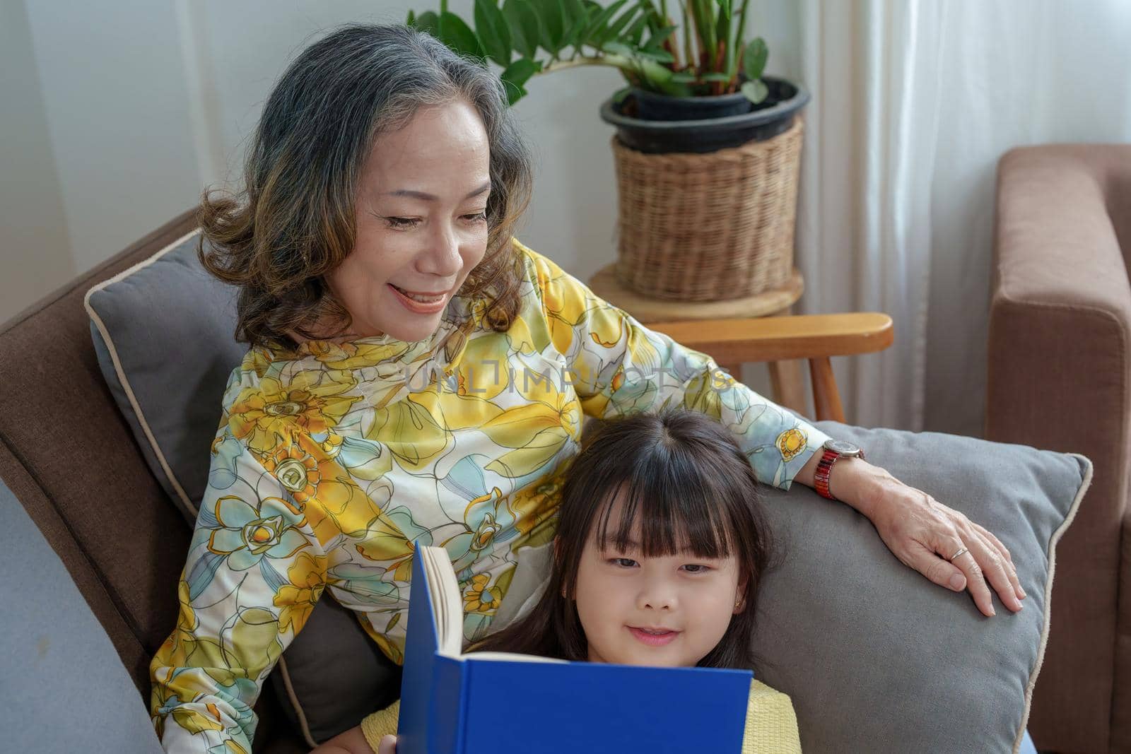 Asian portrait, grandchild granddaughter grandma grandmother and granddaughter happily join in activities to enhance skills for grandchildren.