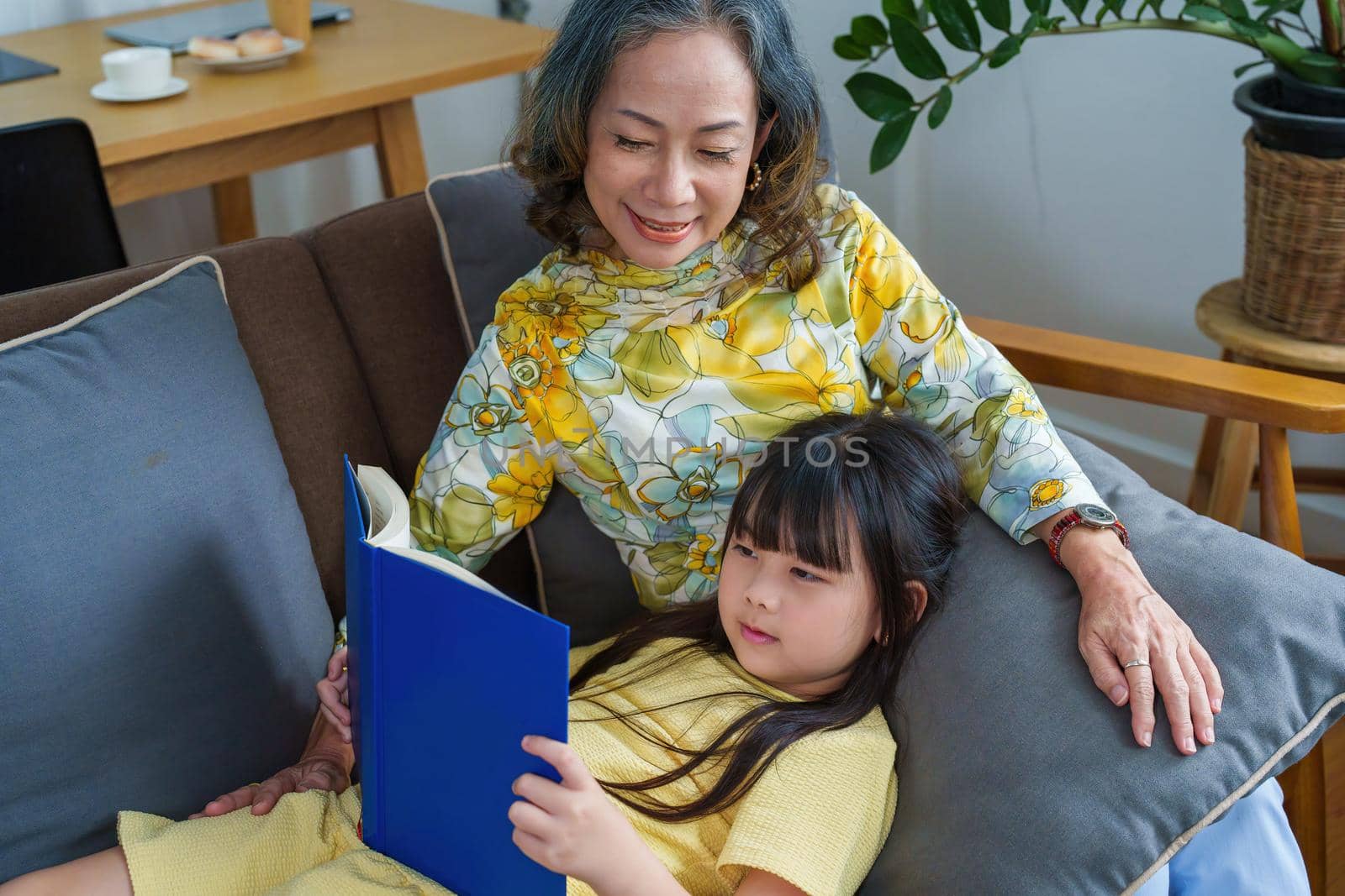 Asian portrait, grandchild granddaughter grandma grandmother and granddaughter happily join in activities to enhance skills for grandchildren.