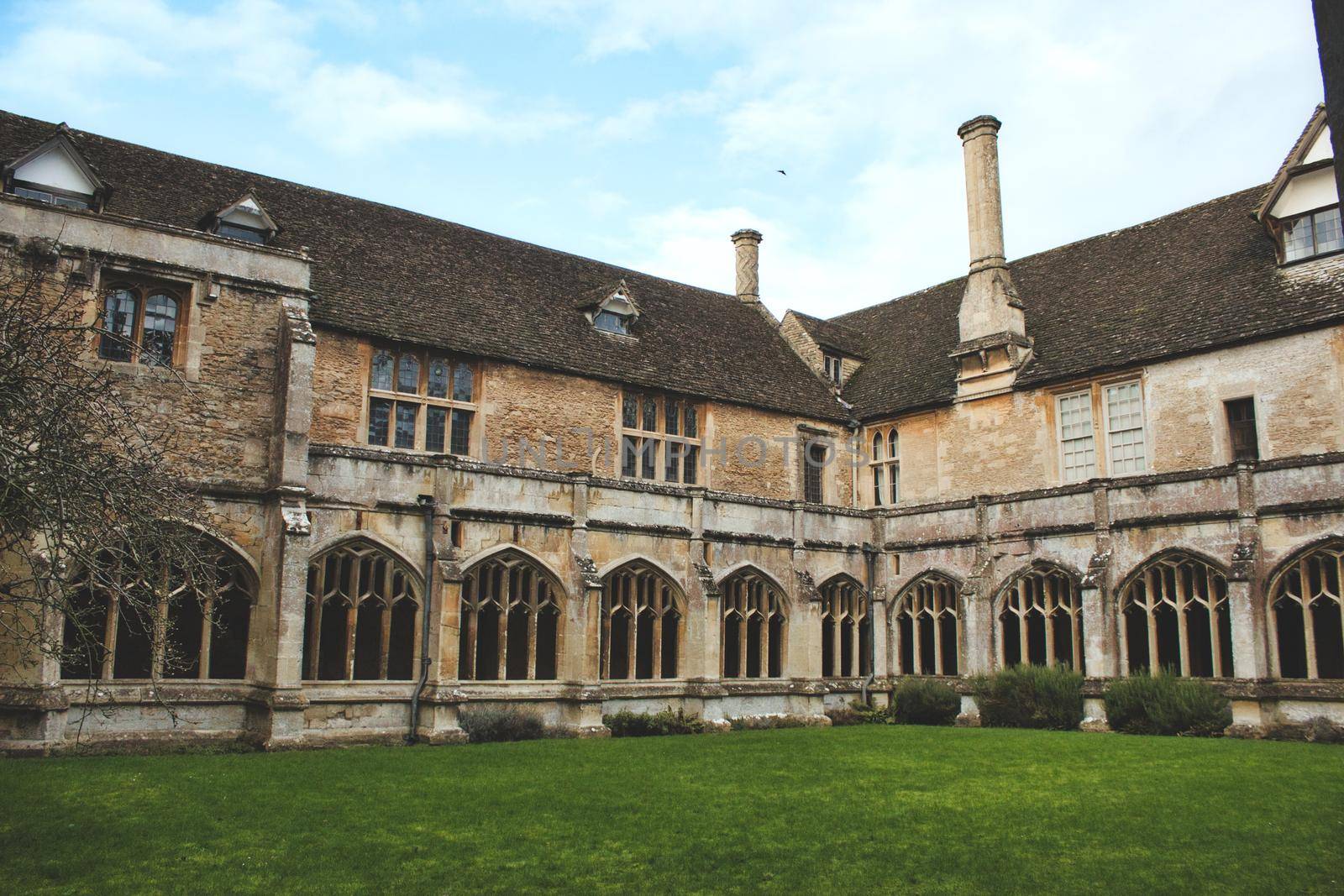 Lacock, England - March 01 2020: Shot of the cloisters and internal courtyard at Lacock Abbey
