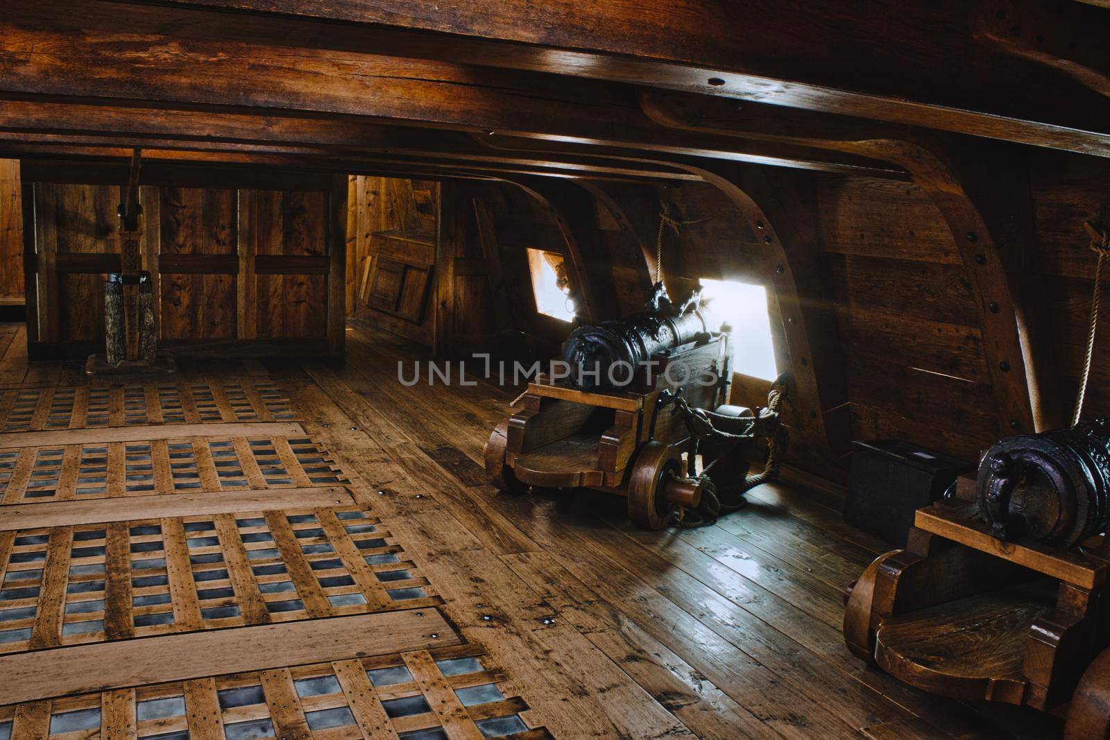 Stockholm, Sweden - 02/22/2019: Vasa museum, Stockholm - Interior of a gun deck on a recreation of the historic warship Vasa with cannons