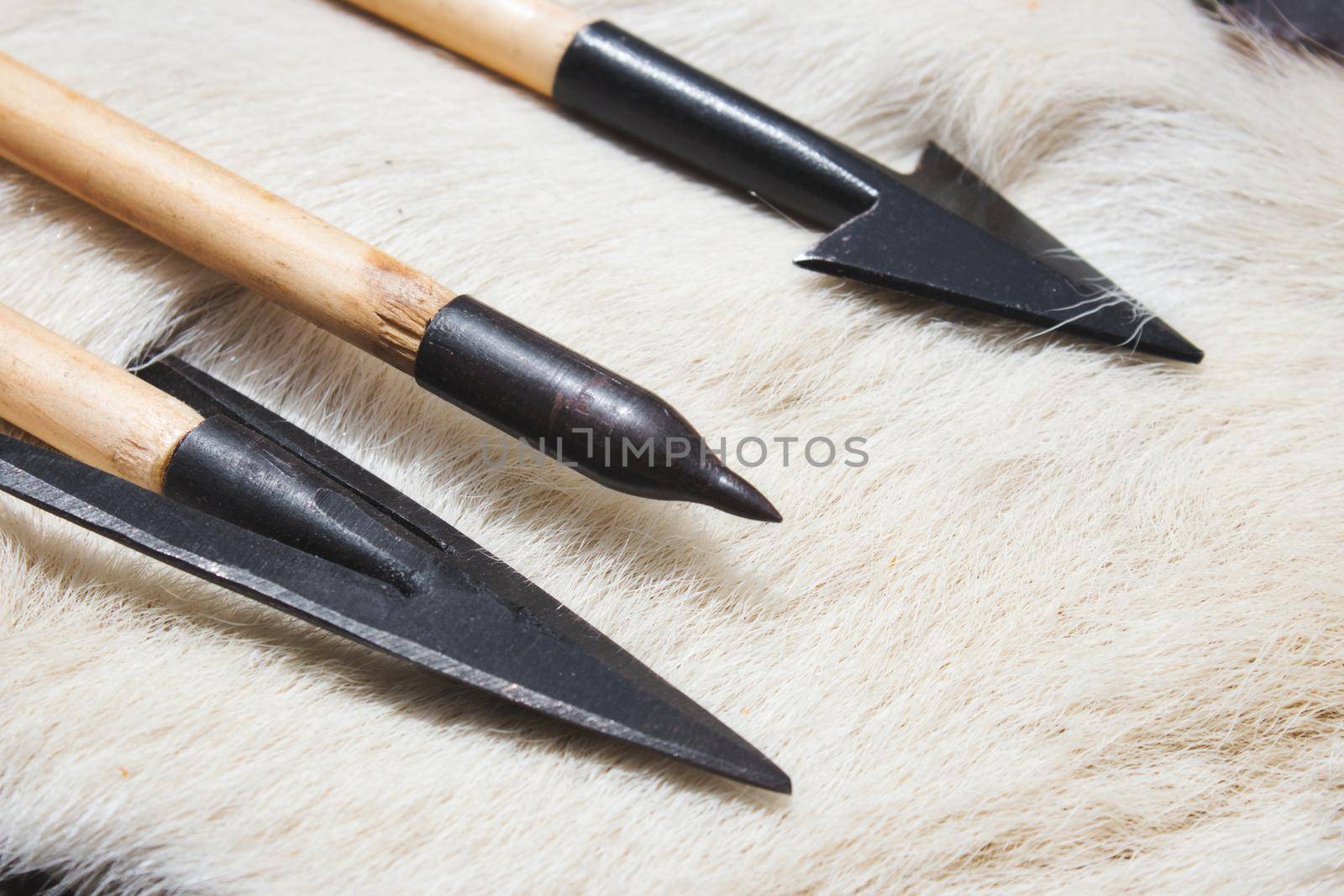 Medieval period arrows with wooden shafts and sharp iron heads by tennesseewitney