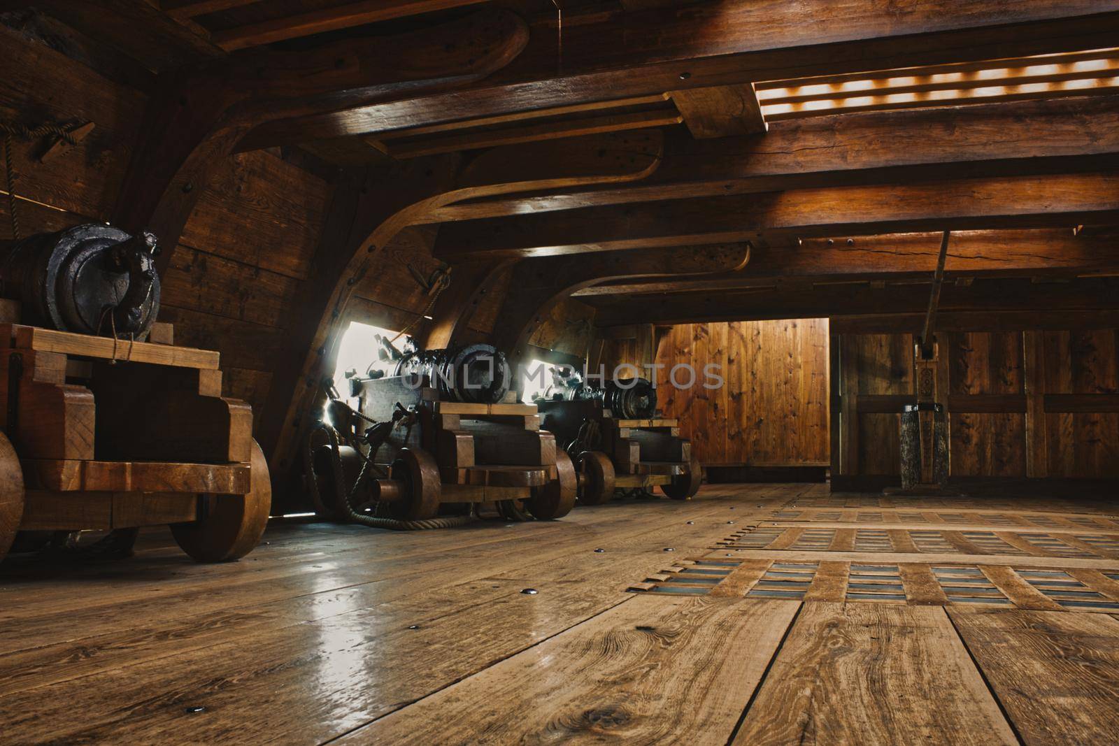 Stockholm, Sweden - February 22 2019: Interior of a gun deck on a historic warship with cannons