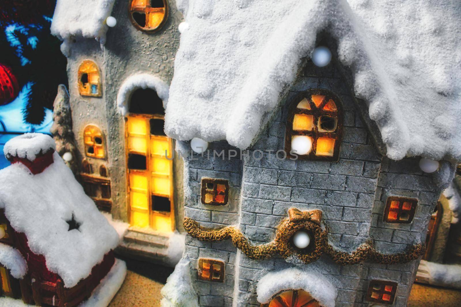 Toy Christmas village with miniature houses covered in snow