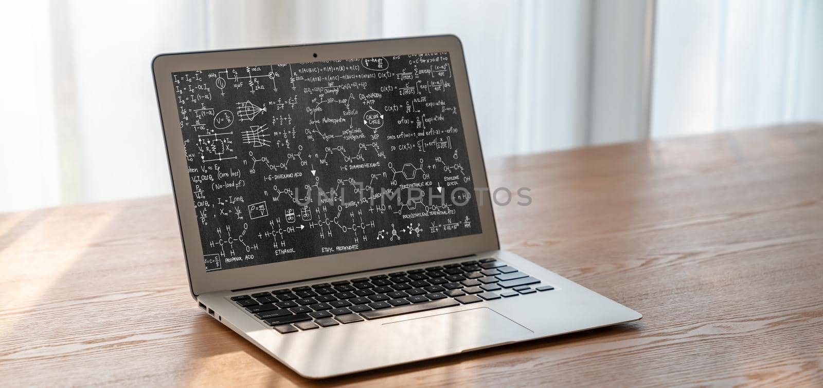 Mathematic equations and modish formula on computer screen showing concept of science and education