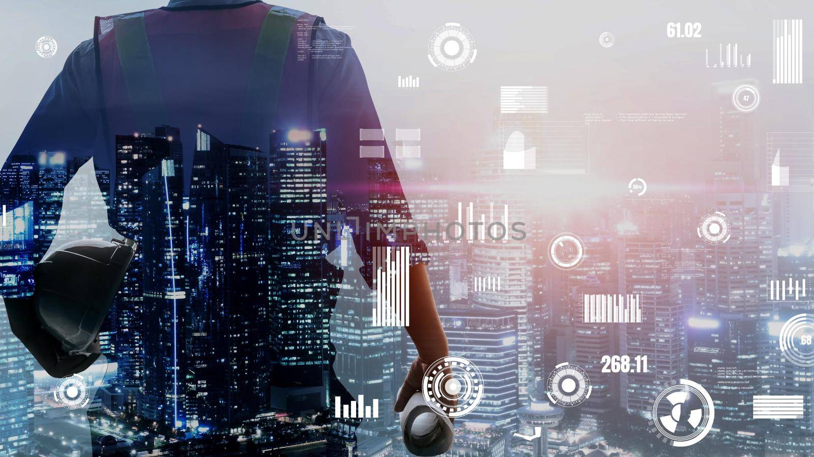 Future building construction and inventive engineering project concept with HUD hologram graphic design. Building engineer, architect people or construction worker works with modern civil technology.