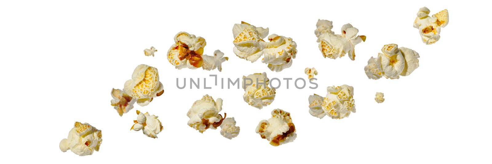 Falling popcorn, isolated on white background. food background.